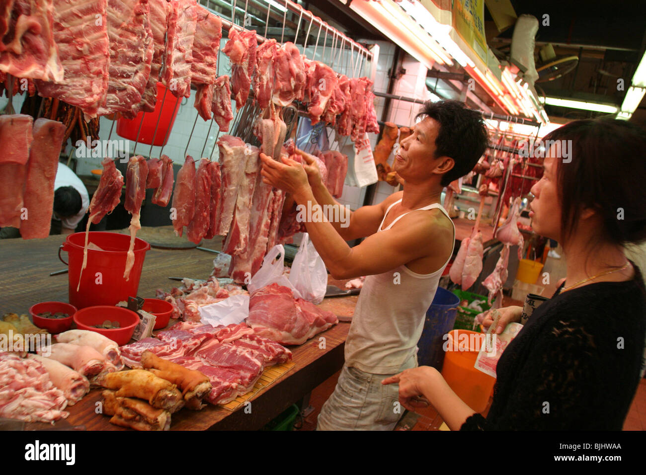 Meat for sale in one of the many market places in Kowloon, Hong Kong, China Stock Photo Alamy
