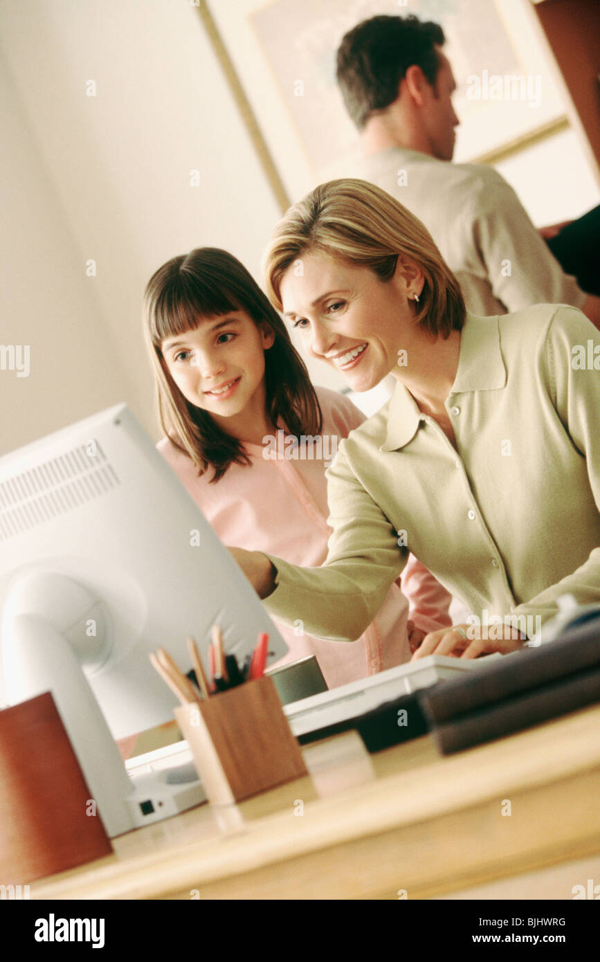 Family in home office Stock Photo - Alamy