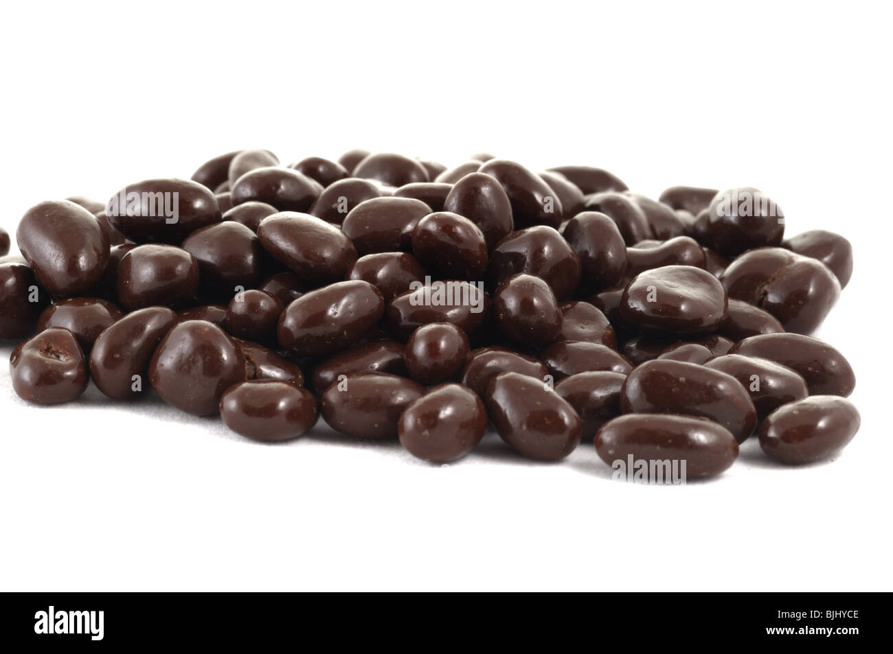 Closeup of fresh raisins in chocolate Stock Photo Alamy