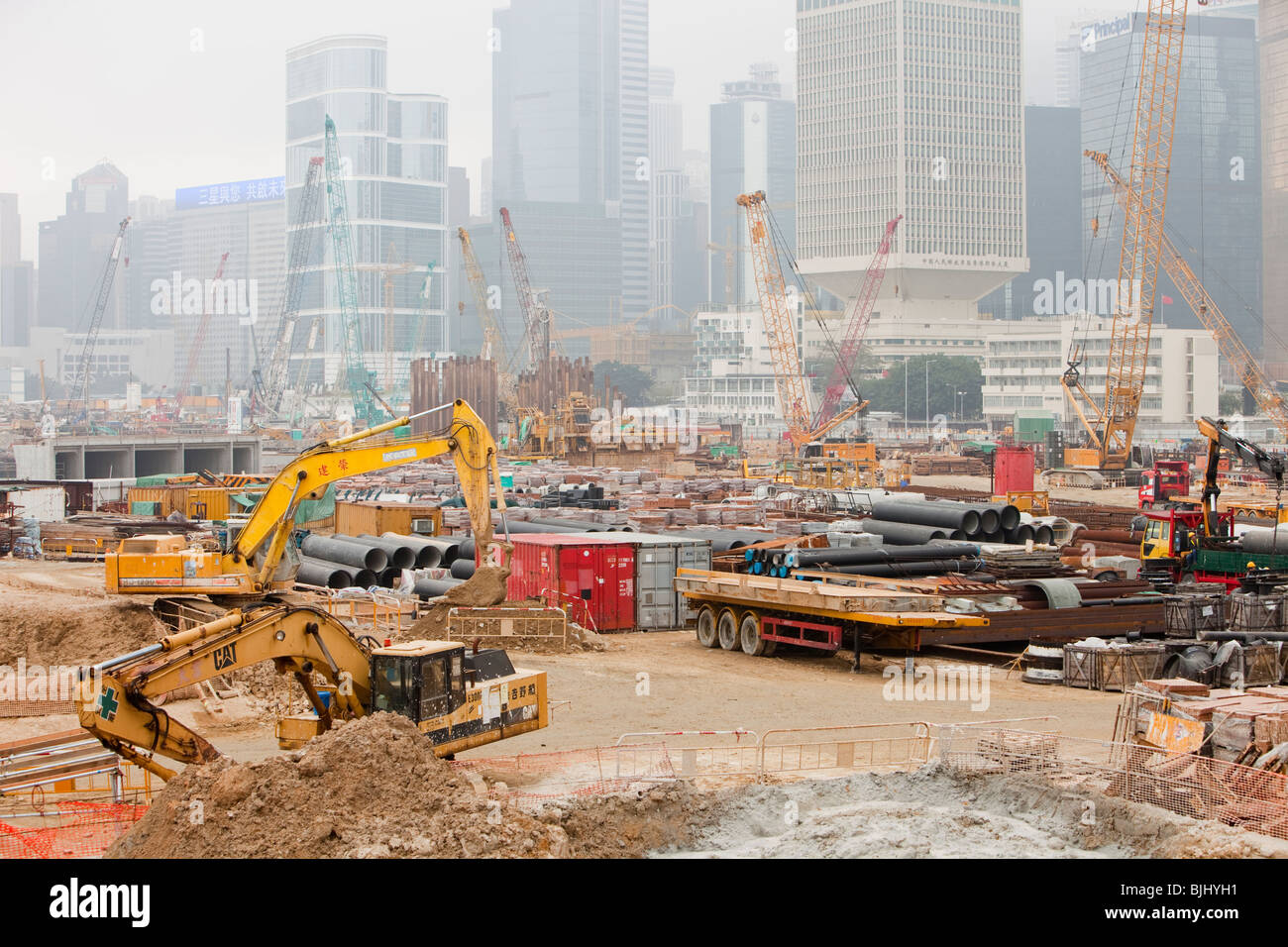 Construction work on the harbour front in Hong Kong, during smoggy