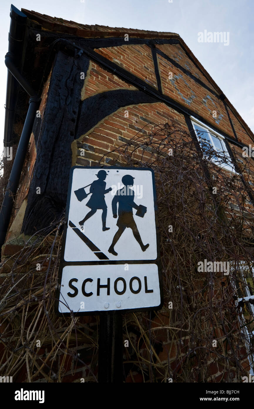 old fashioned traditional school warning street sign in Turville Buckinghamshire UK Stock Photo