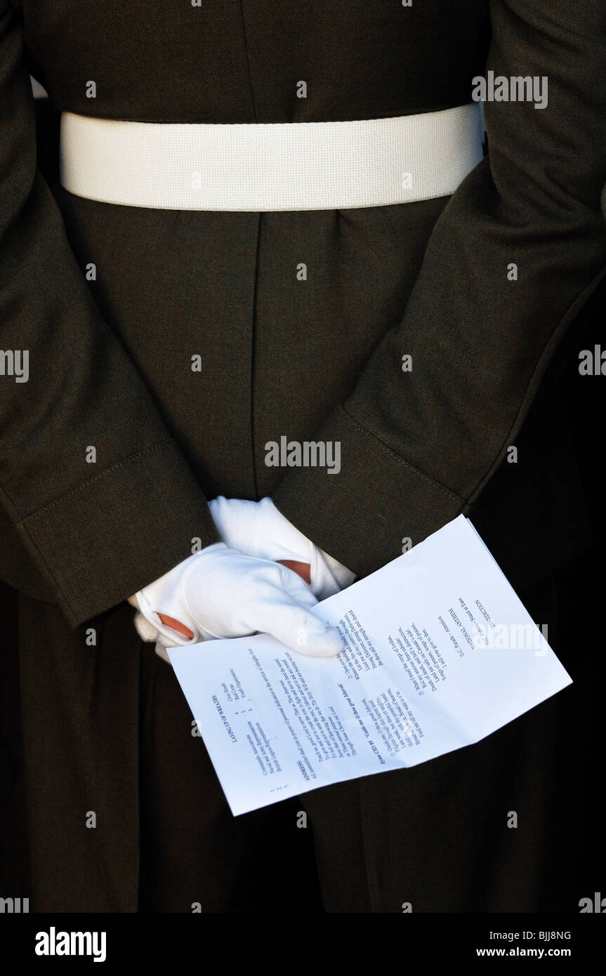 Annual remembrance day service held at the commando memorial spean bridge,highlands,Scotland.Hands holding service with gloves Stock Photo