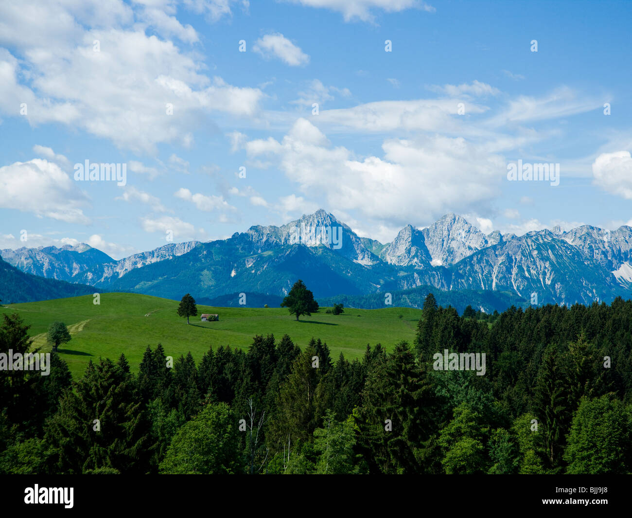 Valley and mountains with blue sky and clouds Stock Photo - Alamy
