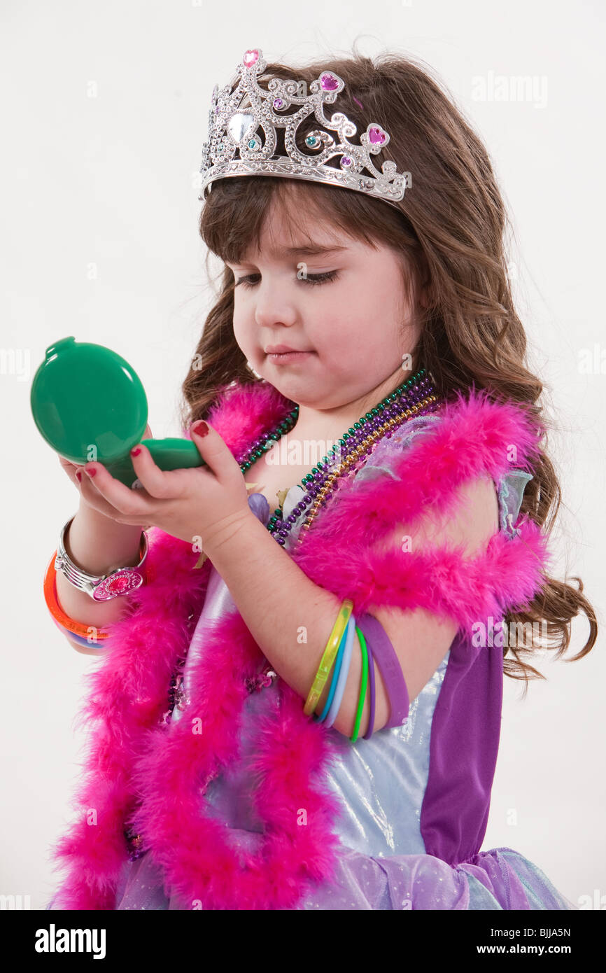 Young cute caucasian toddler girl playing pretend Stock Photo Alamy