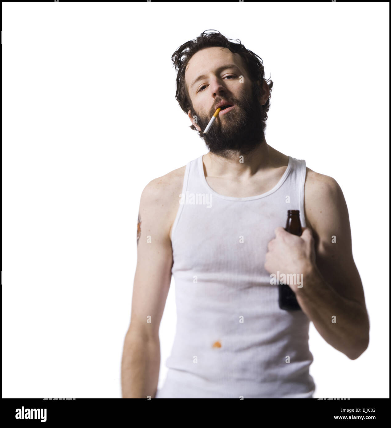 arms crossed holding a cigarette side pov Man standing cigarette crossed arms hi-res stock photography and images