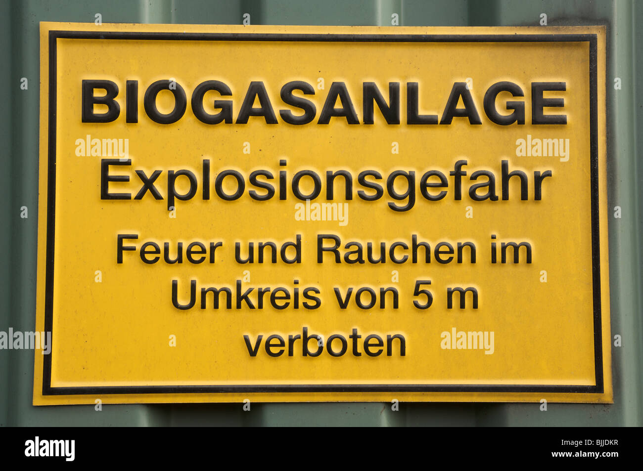 Warning sign on a storage tank containing biogas Stock Photo - Alamy