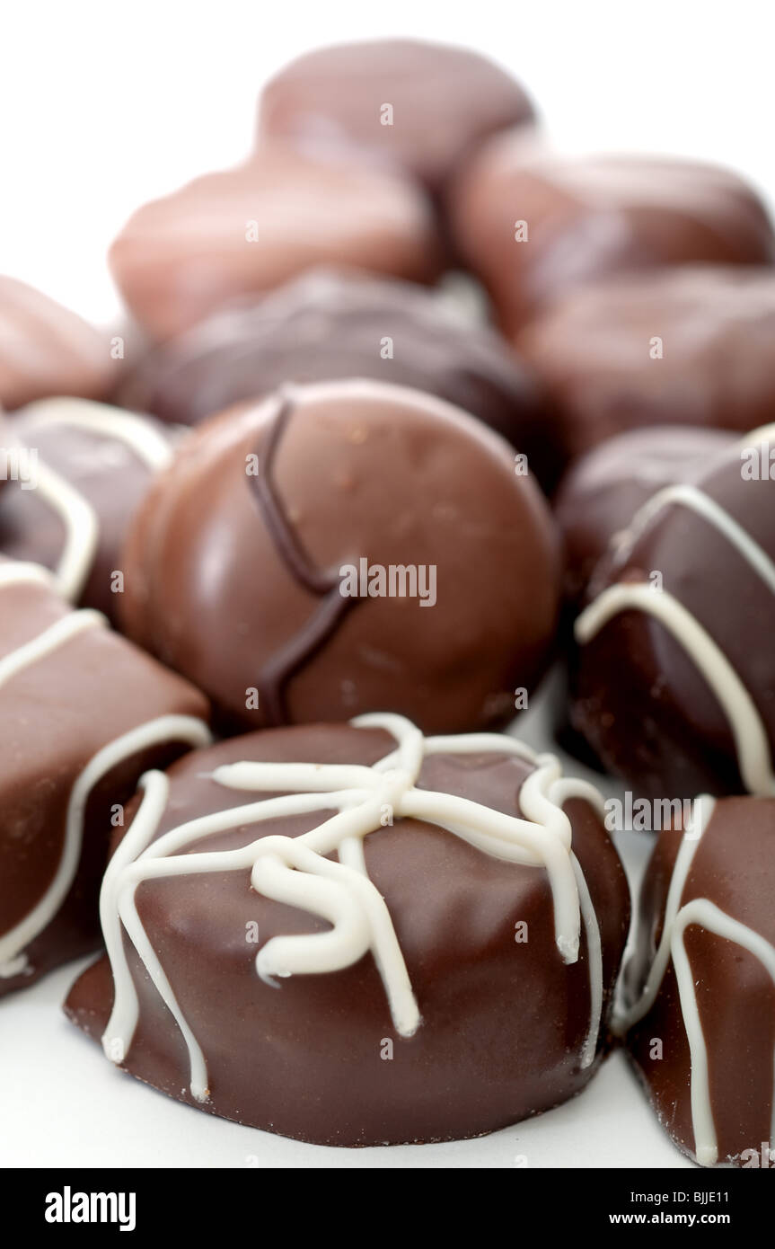 A shallow focus vertical close up of chocolate truffles Stock Photo