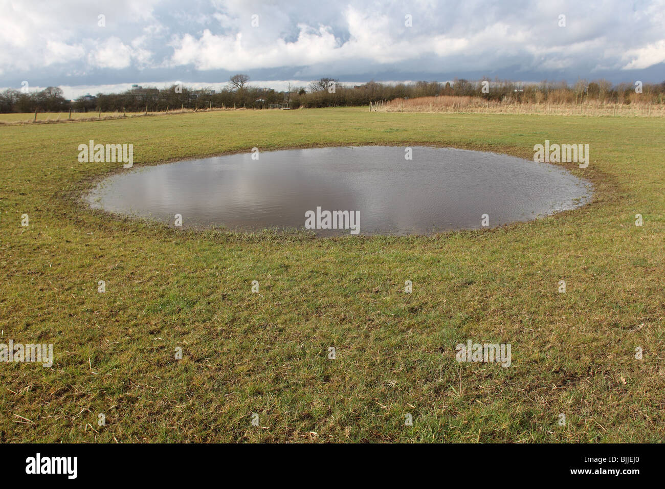 ephemeral seasonal field pond Stock Photo