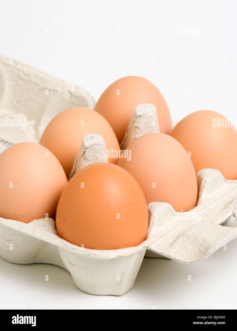 Food, Uncooked, Eggs, Box of six free range eggs on a white background. Stock Photo