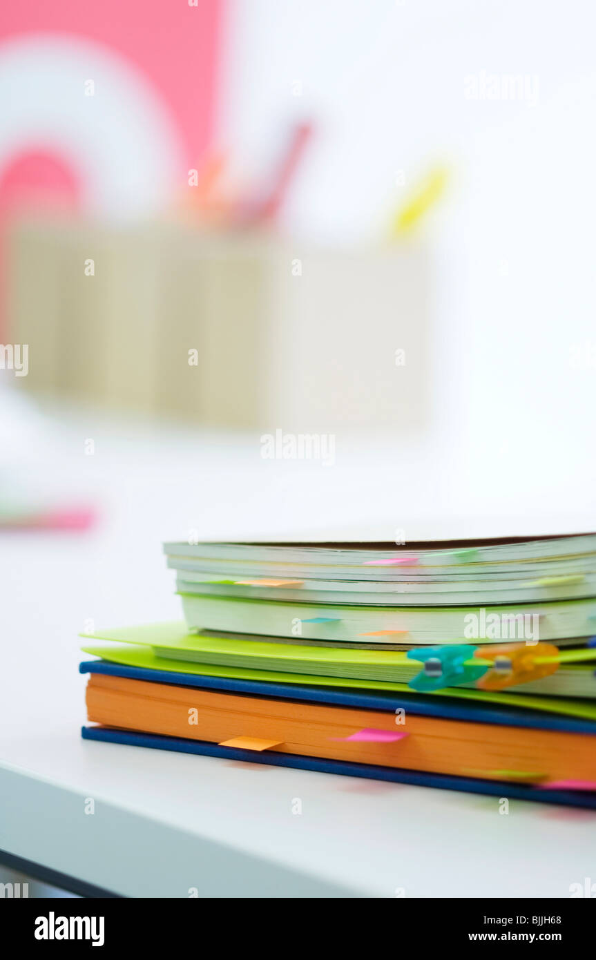 Notebooks with color coded tabs Stock Photo Alamy