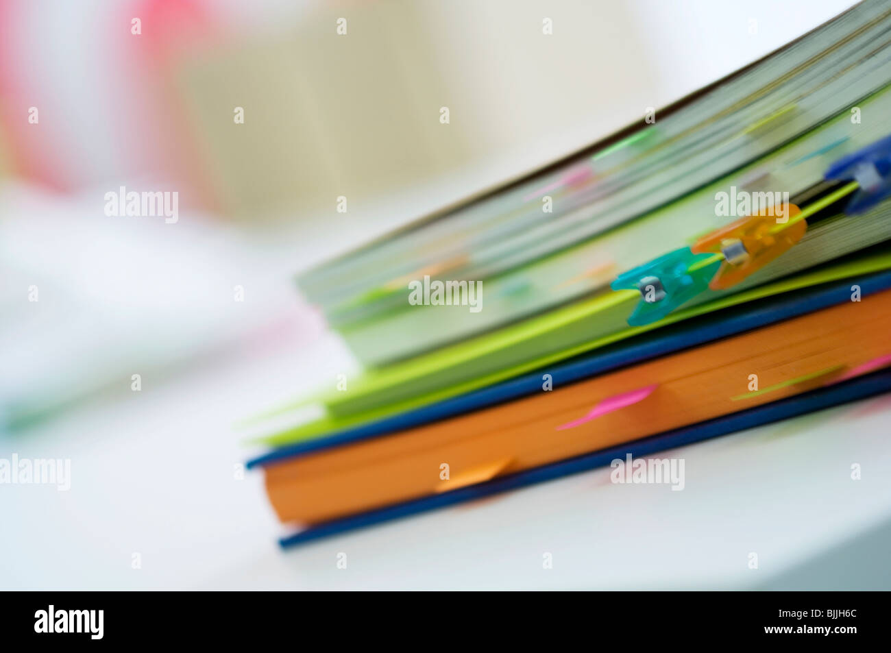 Notebooks with color coded tabs Stock Photo Alamy