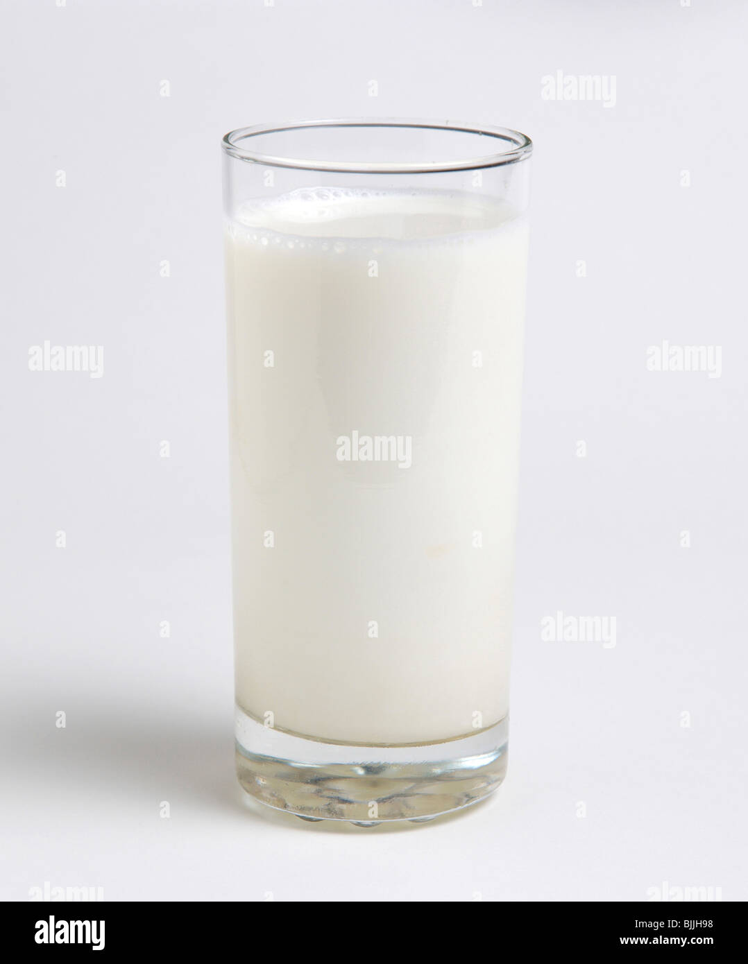 Drink, Milk, Tumbler glass of dairy milk against a white background Stock Photo
