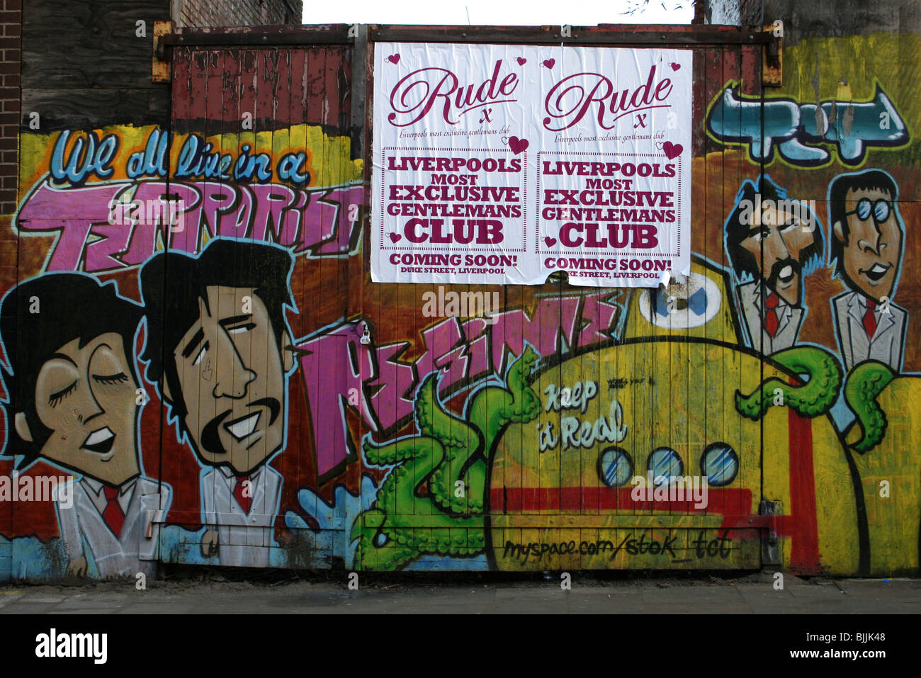 'We All Live In A Terrorist Regime' Beatles Graffiti By TCT, Liverpool, Merseyside, UK Stock Photo
