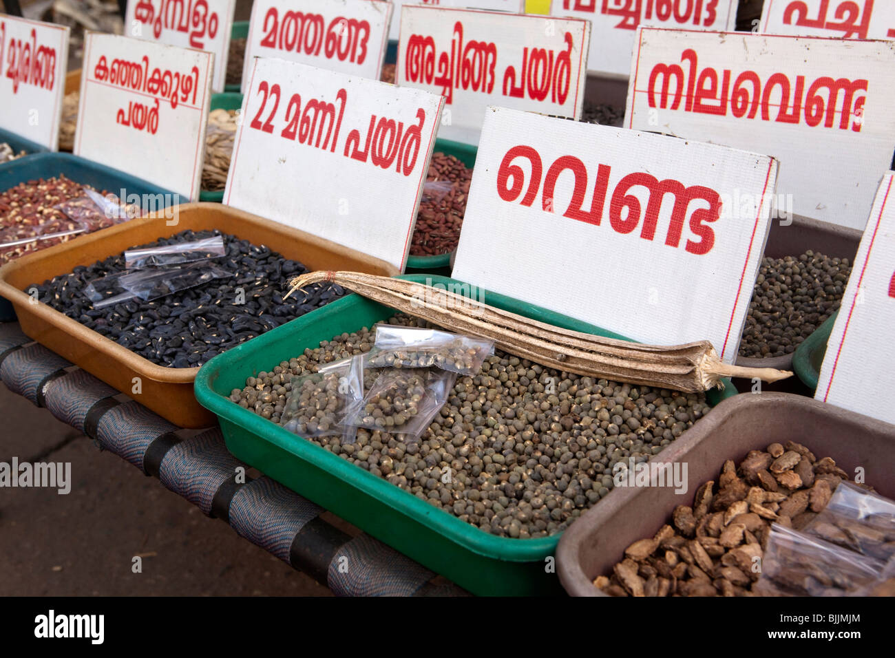 India, Kerala, Alappuzha, (Alleppey), seeds for sale on roadside stall Stock Photo