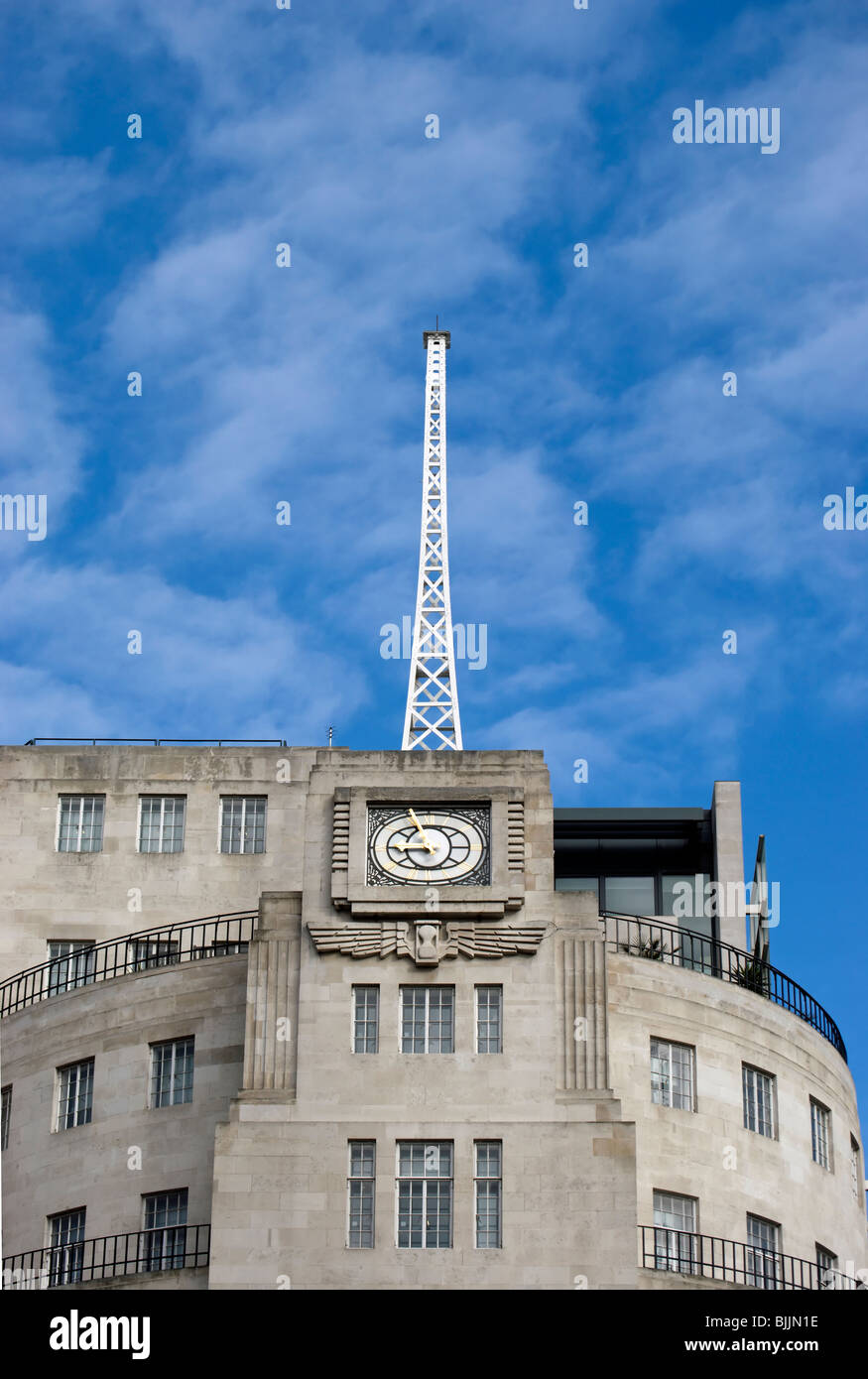 upper level of broadcasting house, home of the bbc, in langham place, london, england, showing radio mast Stock Photo