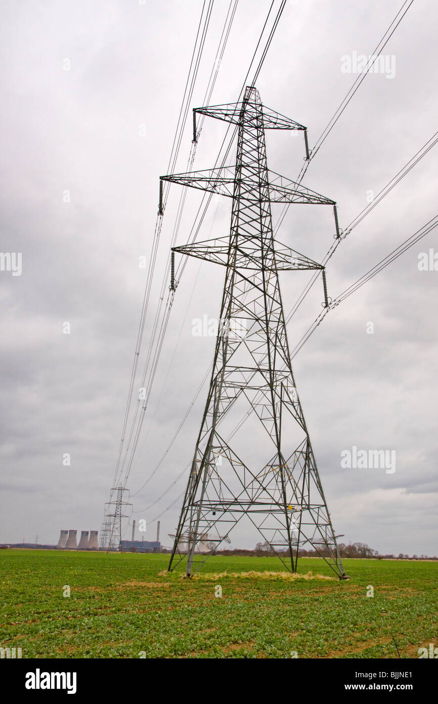 Electricity pylons taking overhead cables  from the West Burton Coal Fired Power Station in Nottinghamshire. Stock Photo