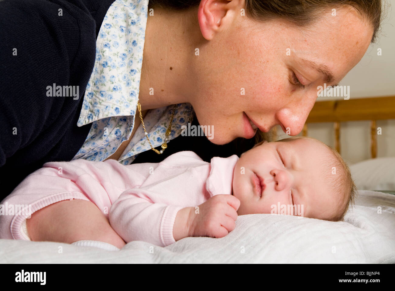 Mother kissing daughter goodbye hires stock photography and images Alamy