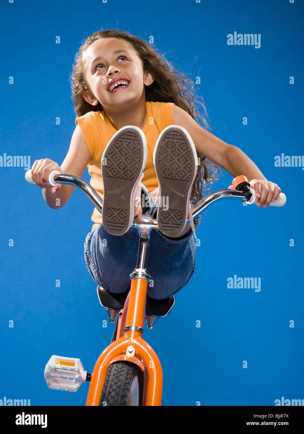 Female Riding Bicycle With No Seat