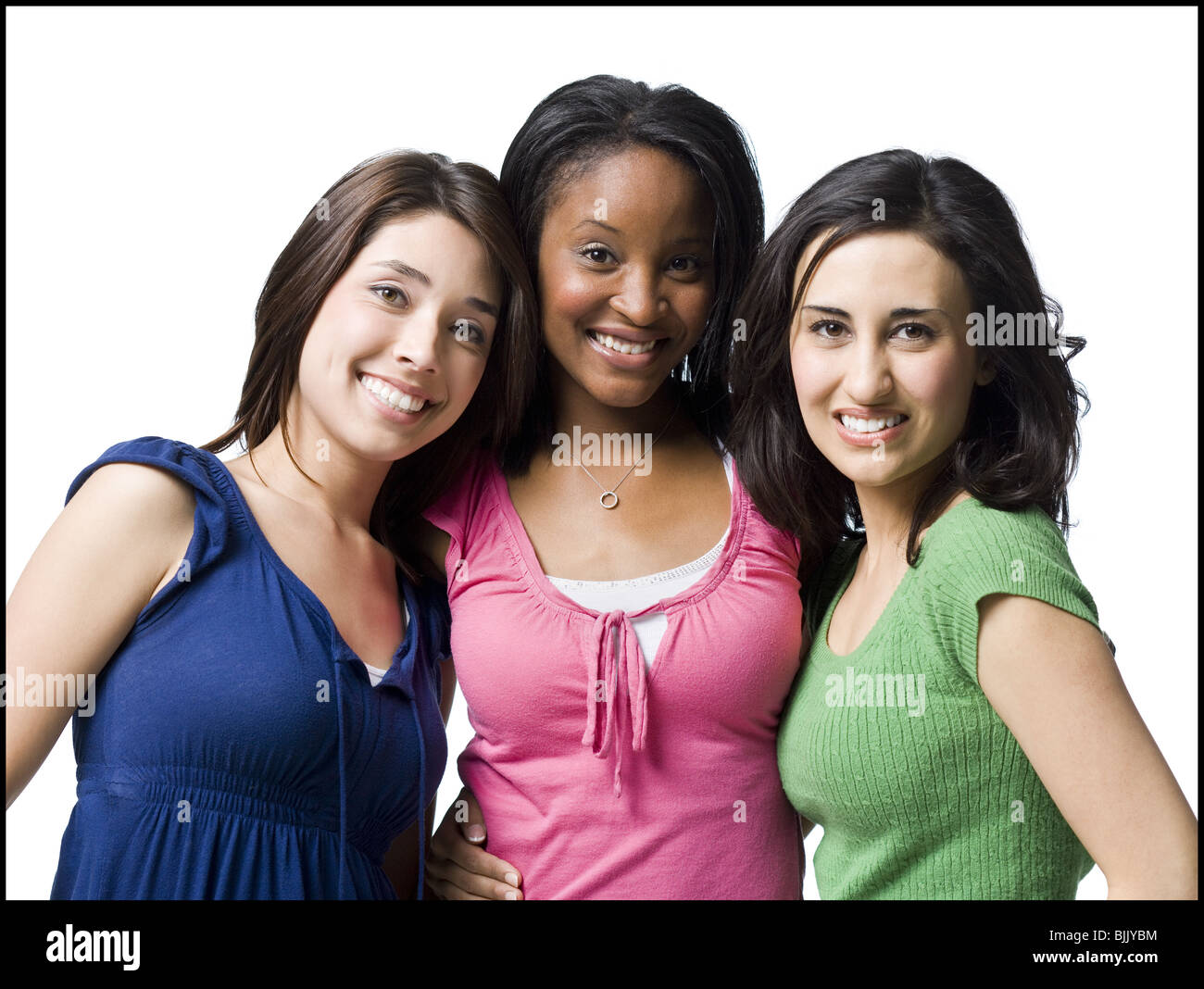 Three women hugging and smiling Stock Photo - Alamy