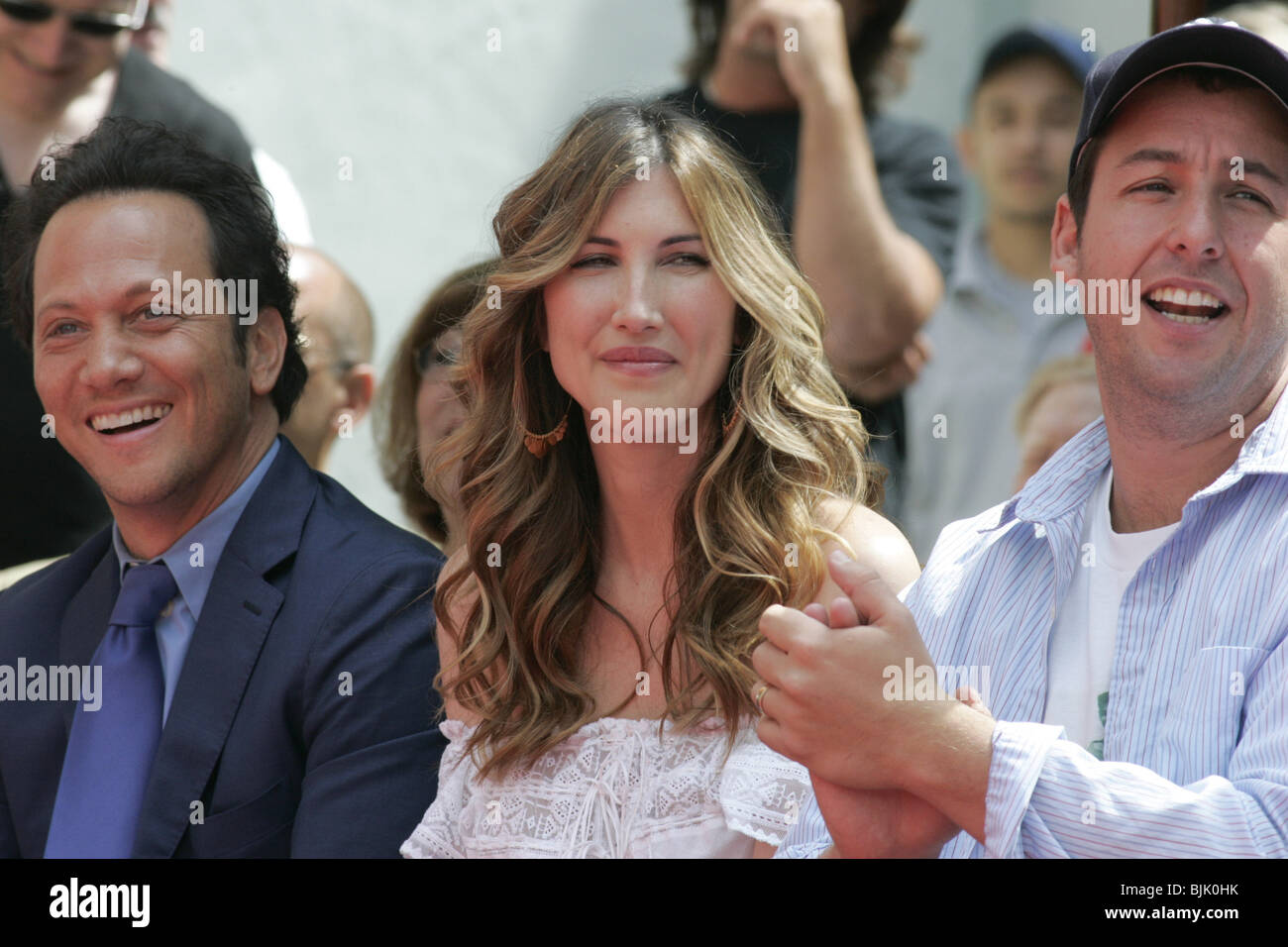 ROB SCHNEIDER JACKIE & ADAM SANDLER ADAM SANDLER HAND AND FOOTPRIN CHINESE THEATRE HOLLYWOOD LOS ANGELES USA 17 May 2005 Stock Photo
