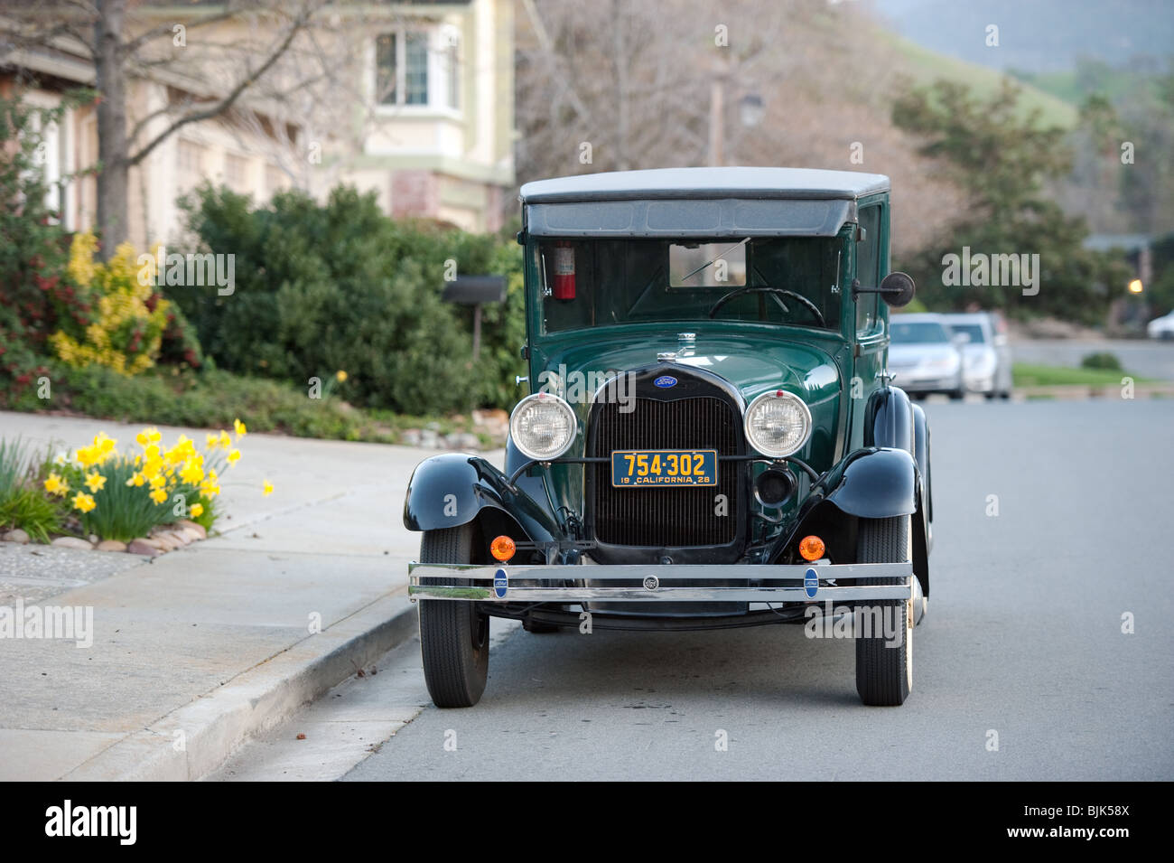 a classic model t ford restored in the suburbs Stock Photo