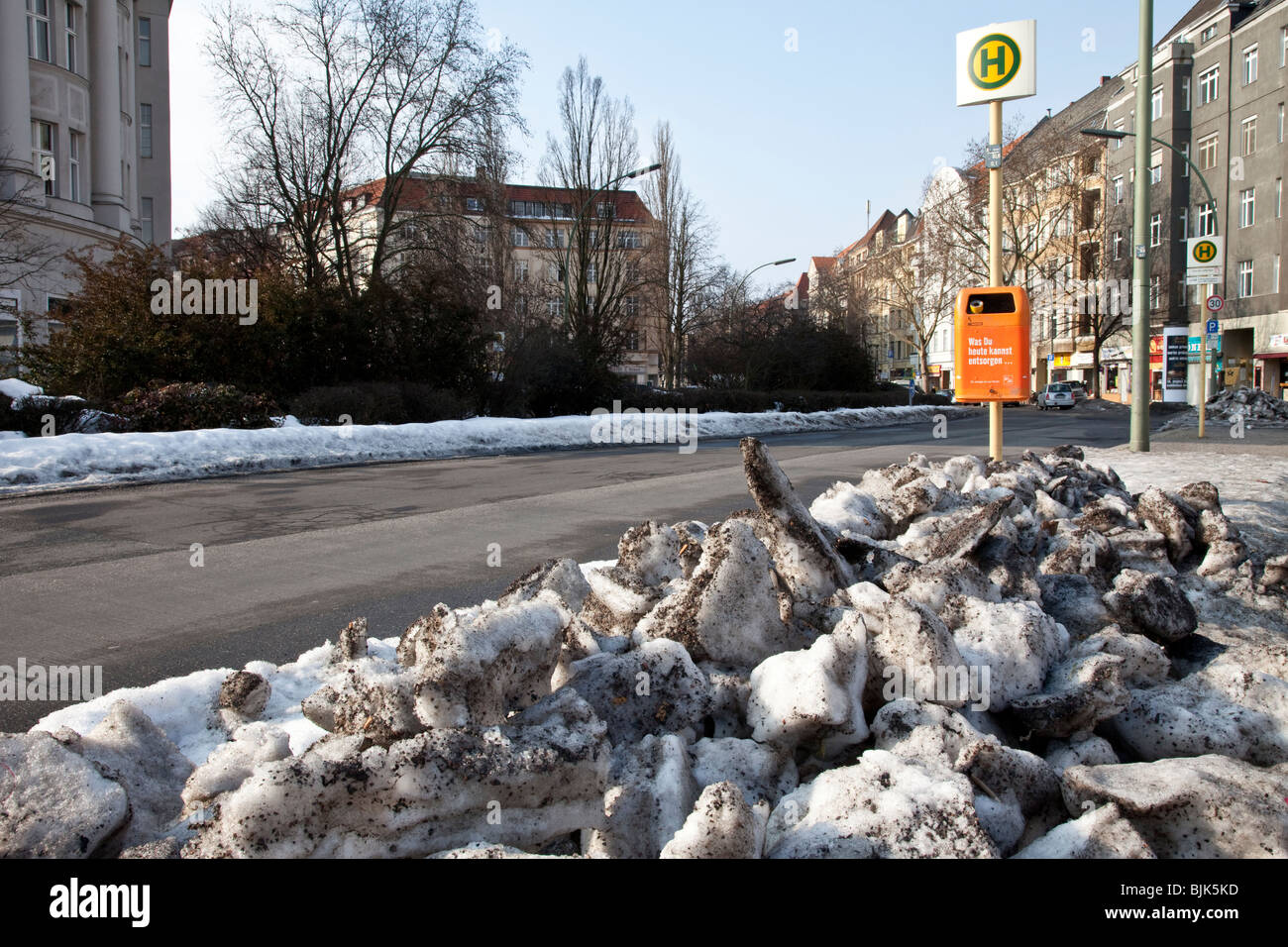 Old dirty snow in the streets of a city, German saying, Schnee von gestern, meaning yesterday's news, Berlin, Germany, Europe Stock Photo