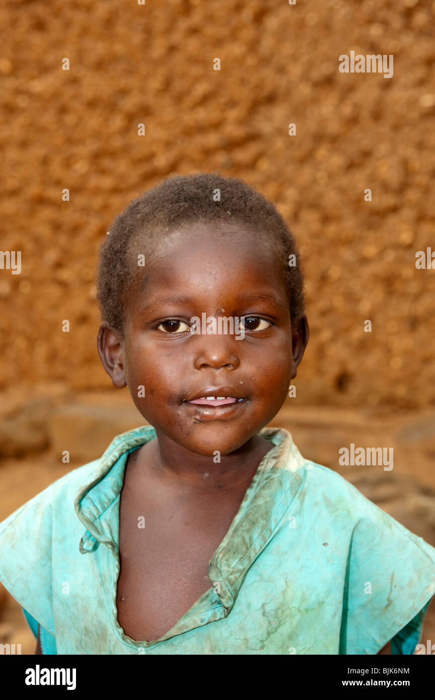 Rwandan child in front of his house Stock Photo - Alamy