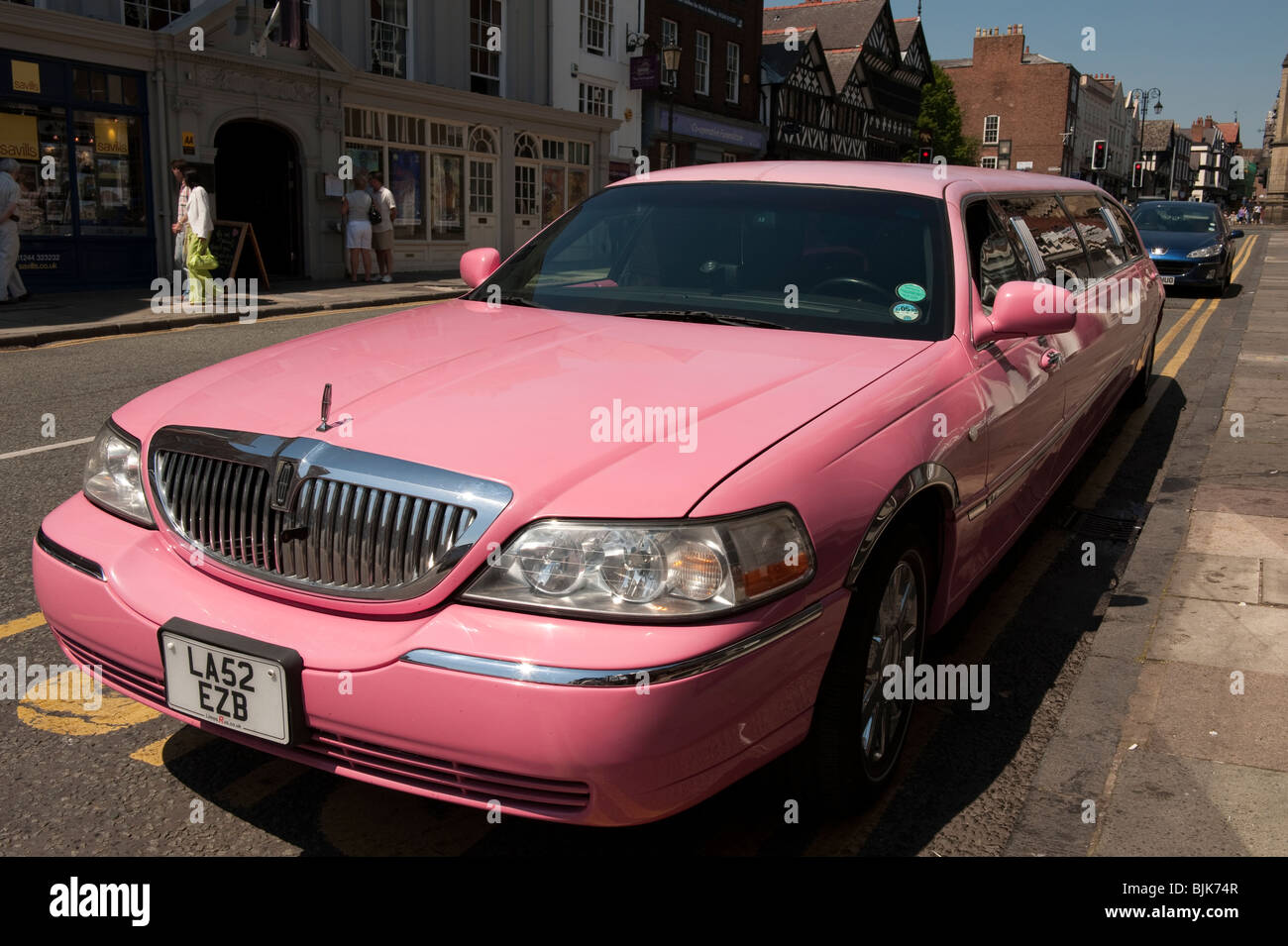 Pink stretch Limousine  Limo American car UK Stock Photo