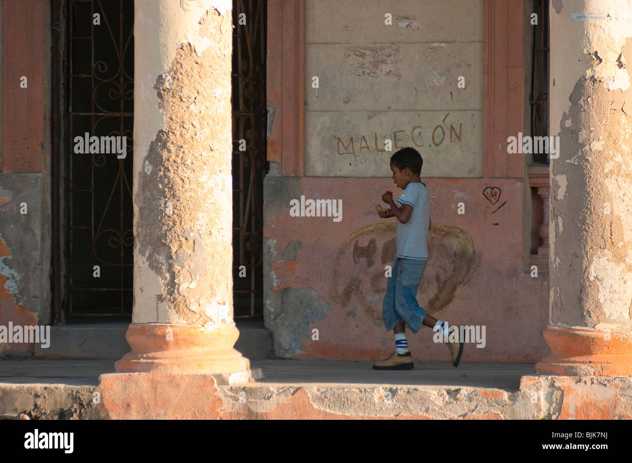 Boy on Malecon, Centro Habana, Havana, Cuba, Caribbean Stock Photo