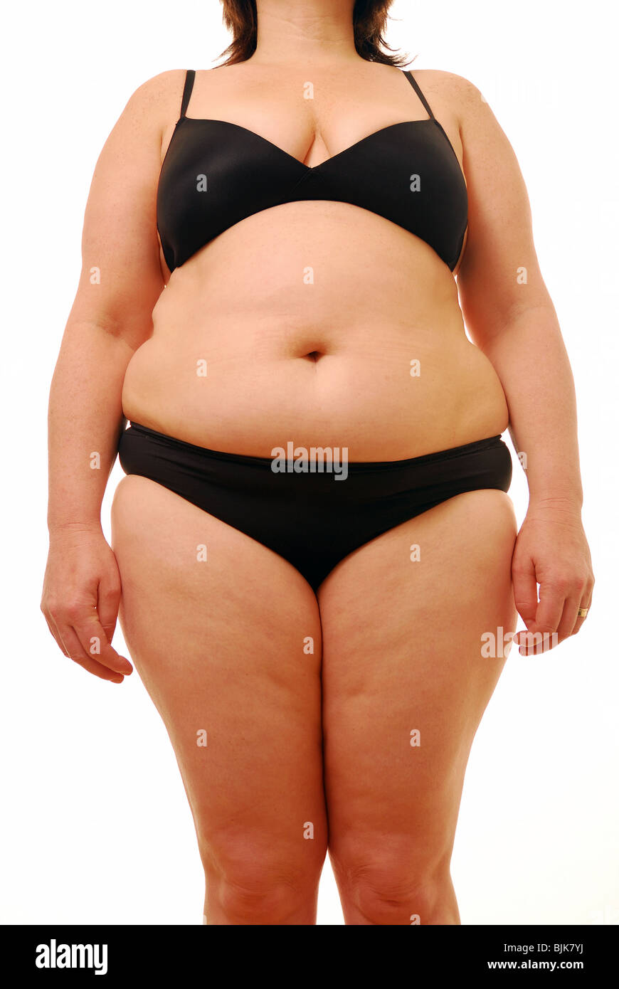 Front view of an overweight lady who needs to make changes to her diet Stock Photo
