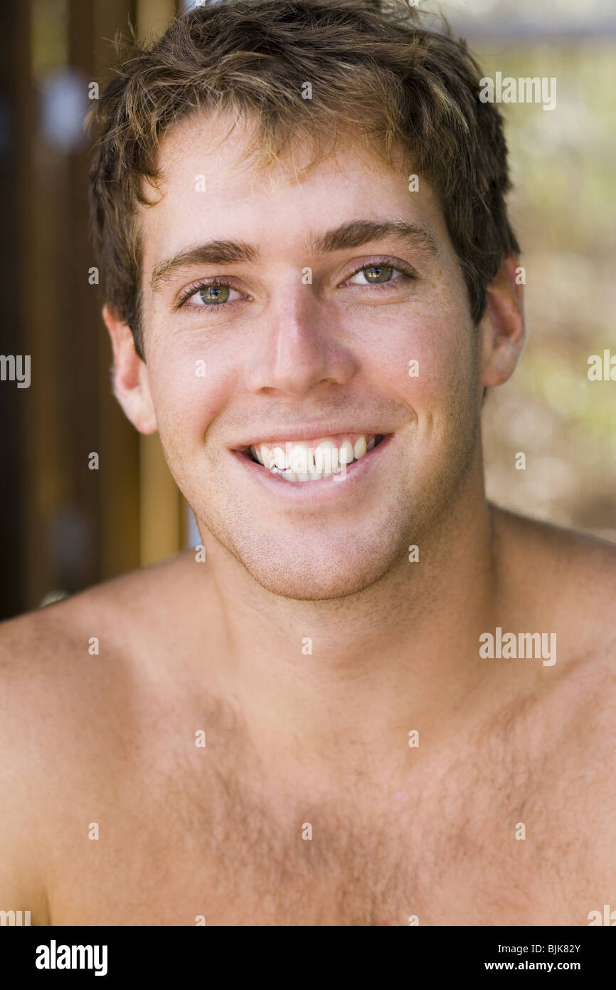 Young man cap smiles hi-res stock photography and images - Alamy