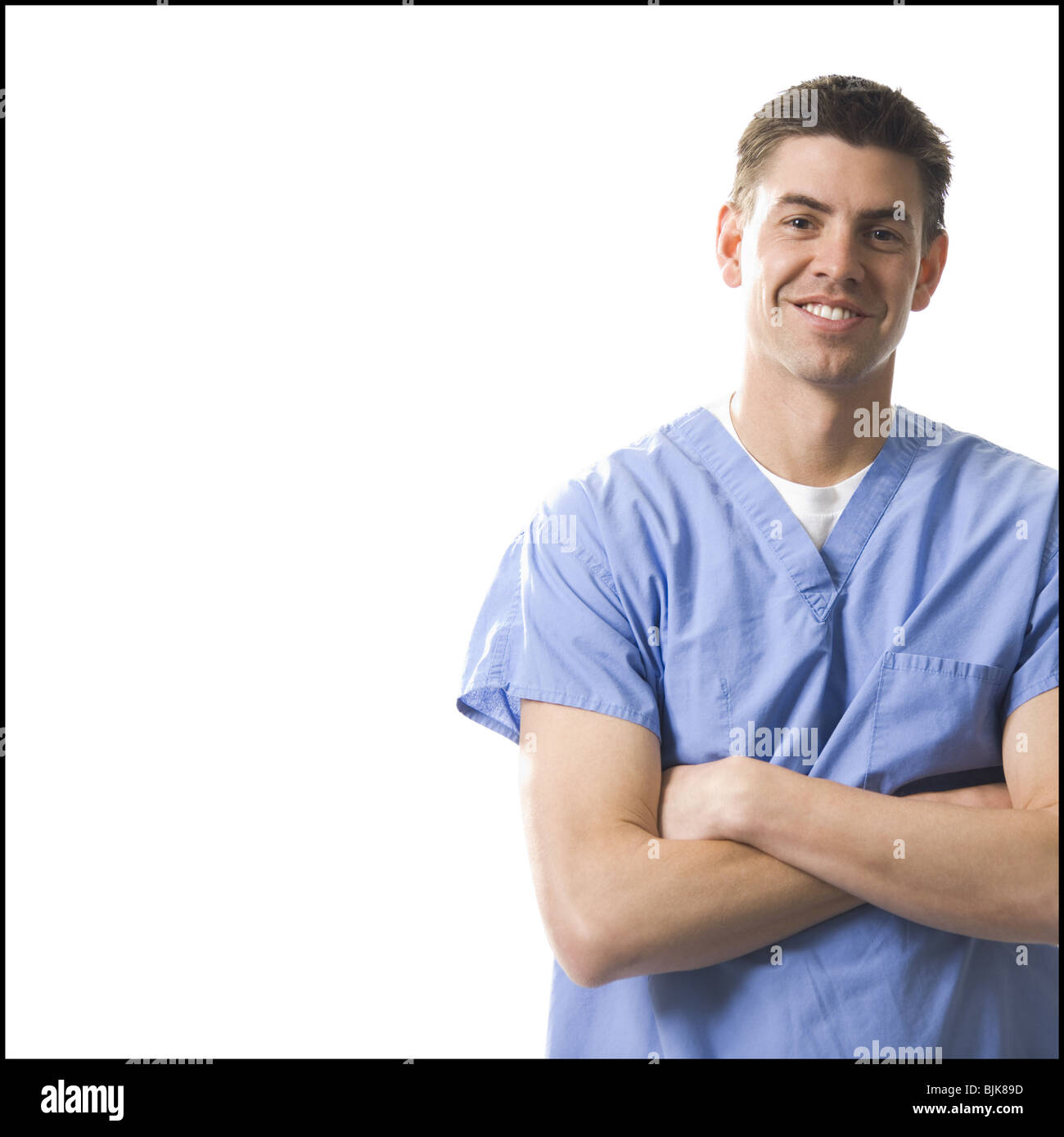 Portrait of a male medical practitioner with stethoscope smiling Stock Photo