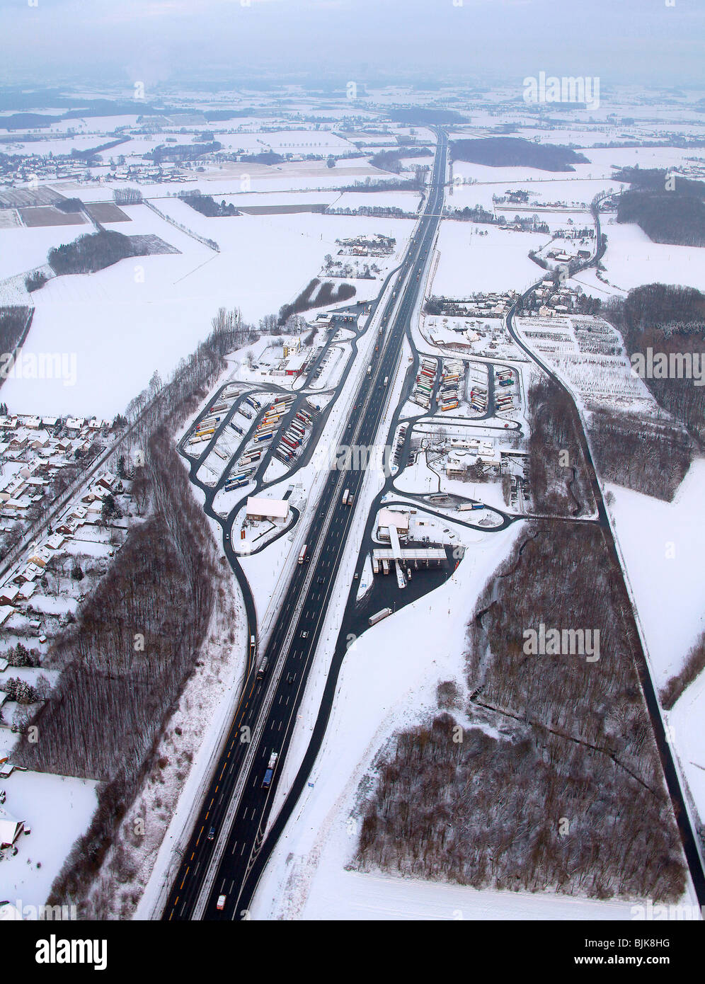 Aerial photo, Rhynern, A2 Autobahn, highway petrol station and rest stop, snow-covered, Hamm, Ruhr area, North Rhine-Westphalia Stock Photo