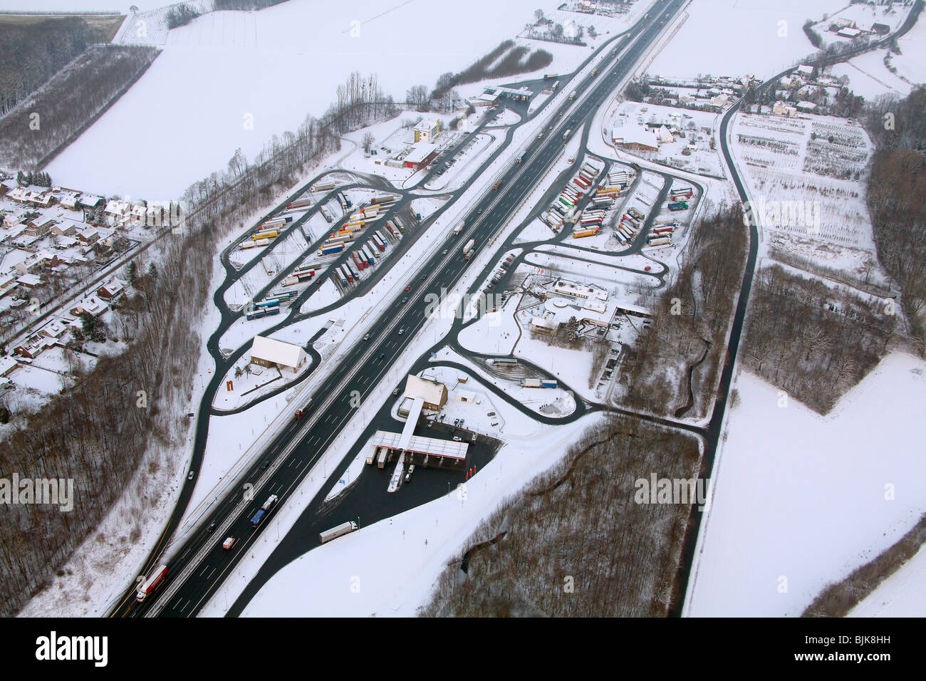 Aerial photo, Rhynern, A2 Autobahn, highway petrol station and rest stop, snow-covered, Hamm, Ruhr area, North Rhine-Westphalia Stock Photo