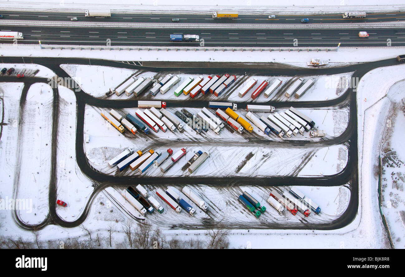 Aerial photo, Rhynern, A2 Autobahn, highway petrol station and rest stop, snow-covered truck parking area, Hamm, Ruhr area, Nor Stock Photo