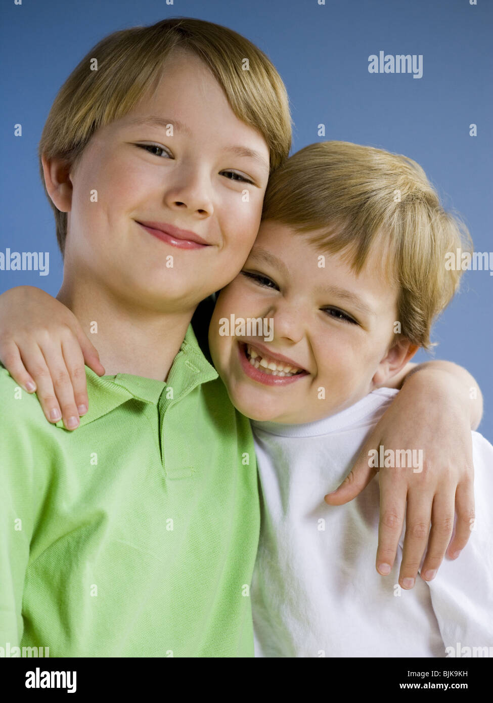 Portrait of two boys smiling Stock Photo - Alamy