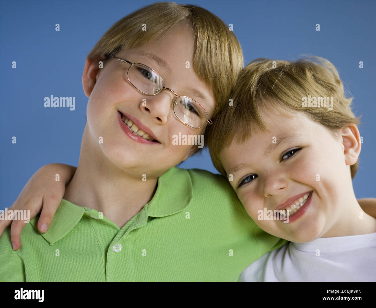 Portrait of two boys smiling Stock Photo - Alamy