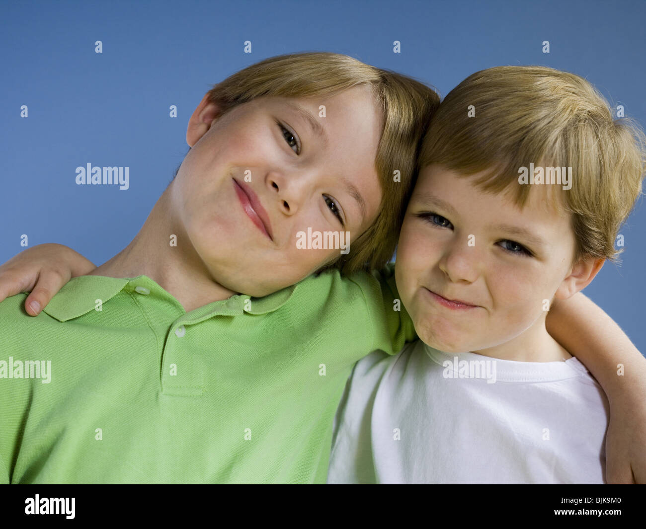 Portrait of two boys smiling Stock Photo - Alamy