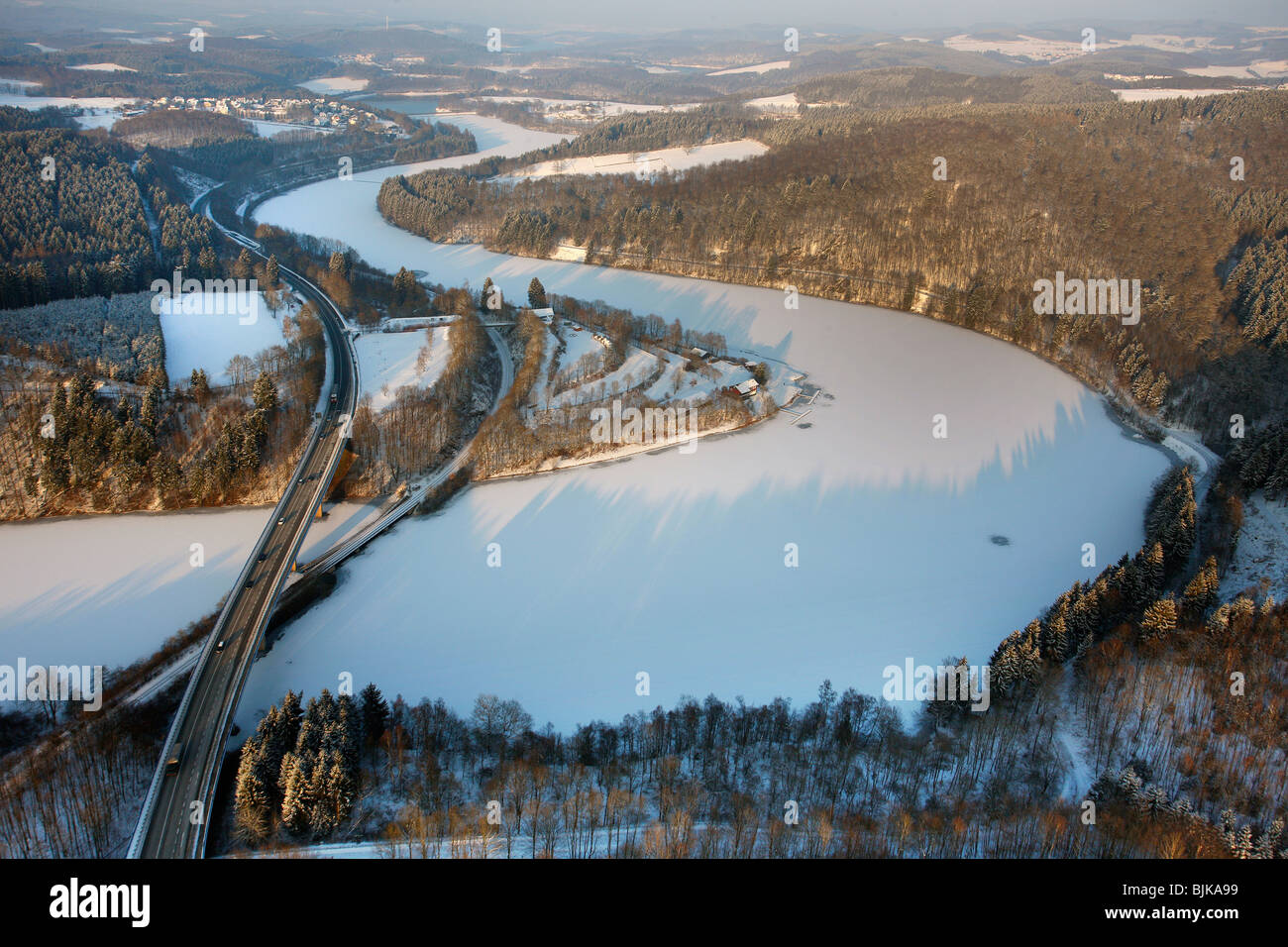 Aerial photo, Biggesee Reservoir in the snow in winter, Olpe, Sauerland