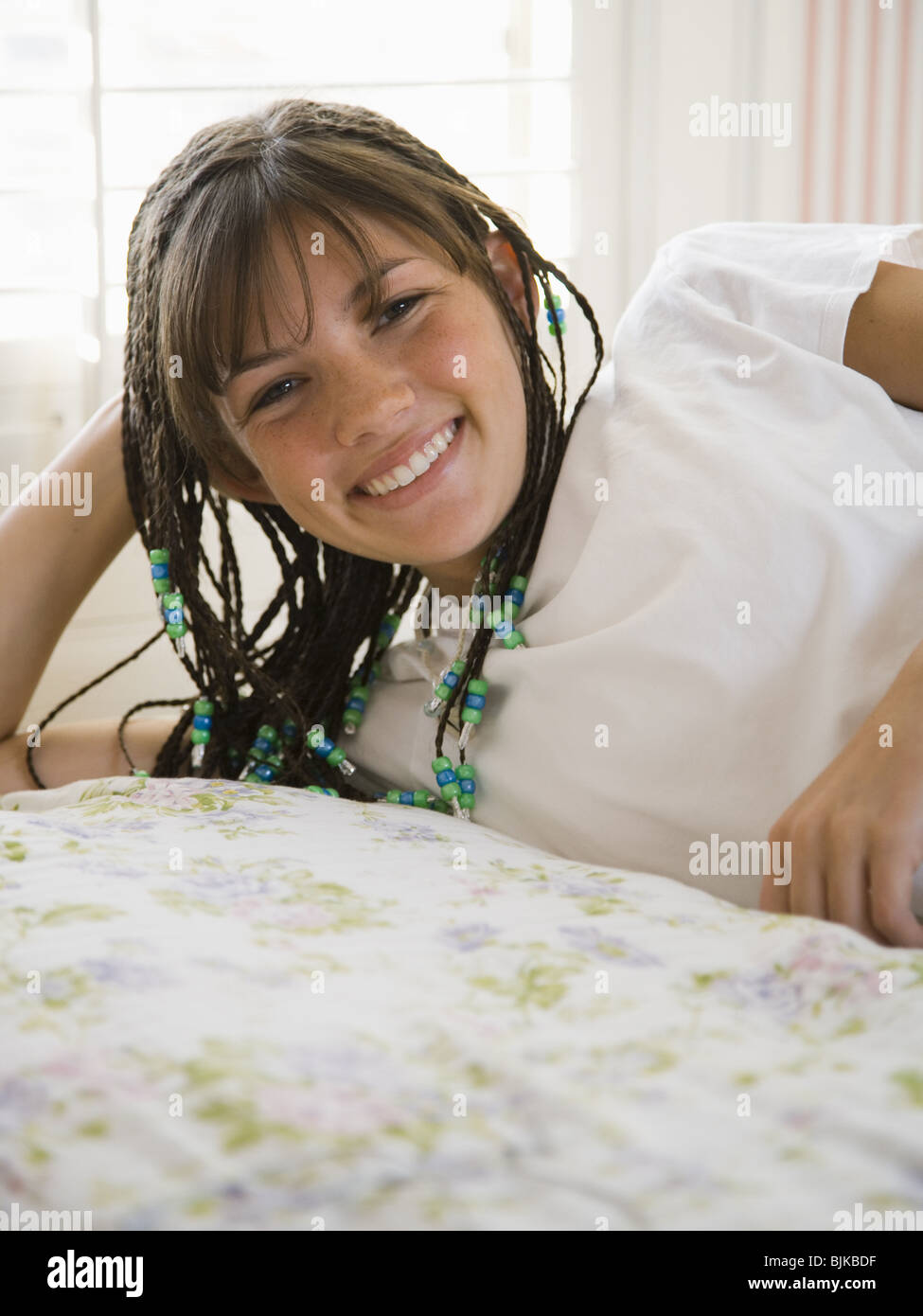Teen Girl Lying On Bed High Resolution Stock Photography and Images - Alamy