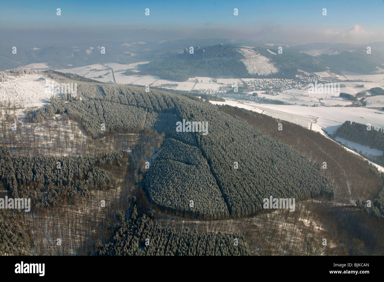 Aerial photo, Bruchhauser Steine, four large porphyry rocks located on a mountain, snow, winter, Olsberg, Sauerland, North Rhin Stock Photo