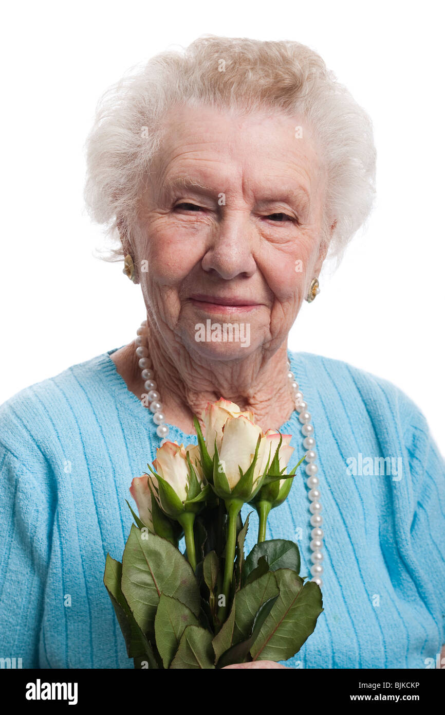 Older Woman with roses Stock Photo