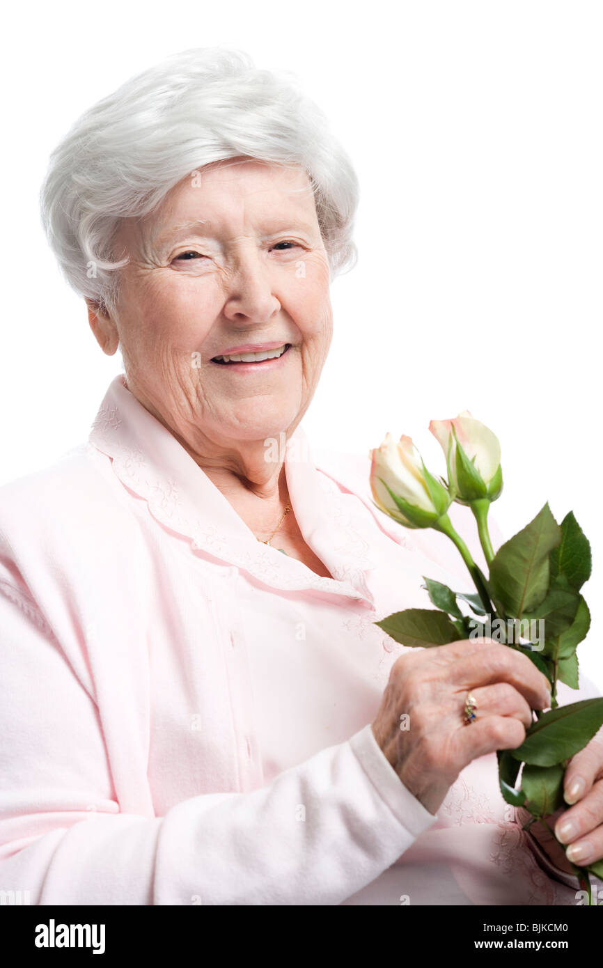 Portrait of an elderly woman smiling Stock Photo