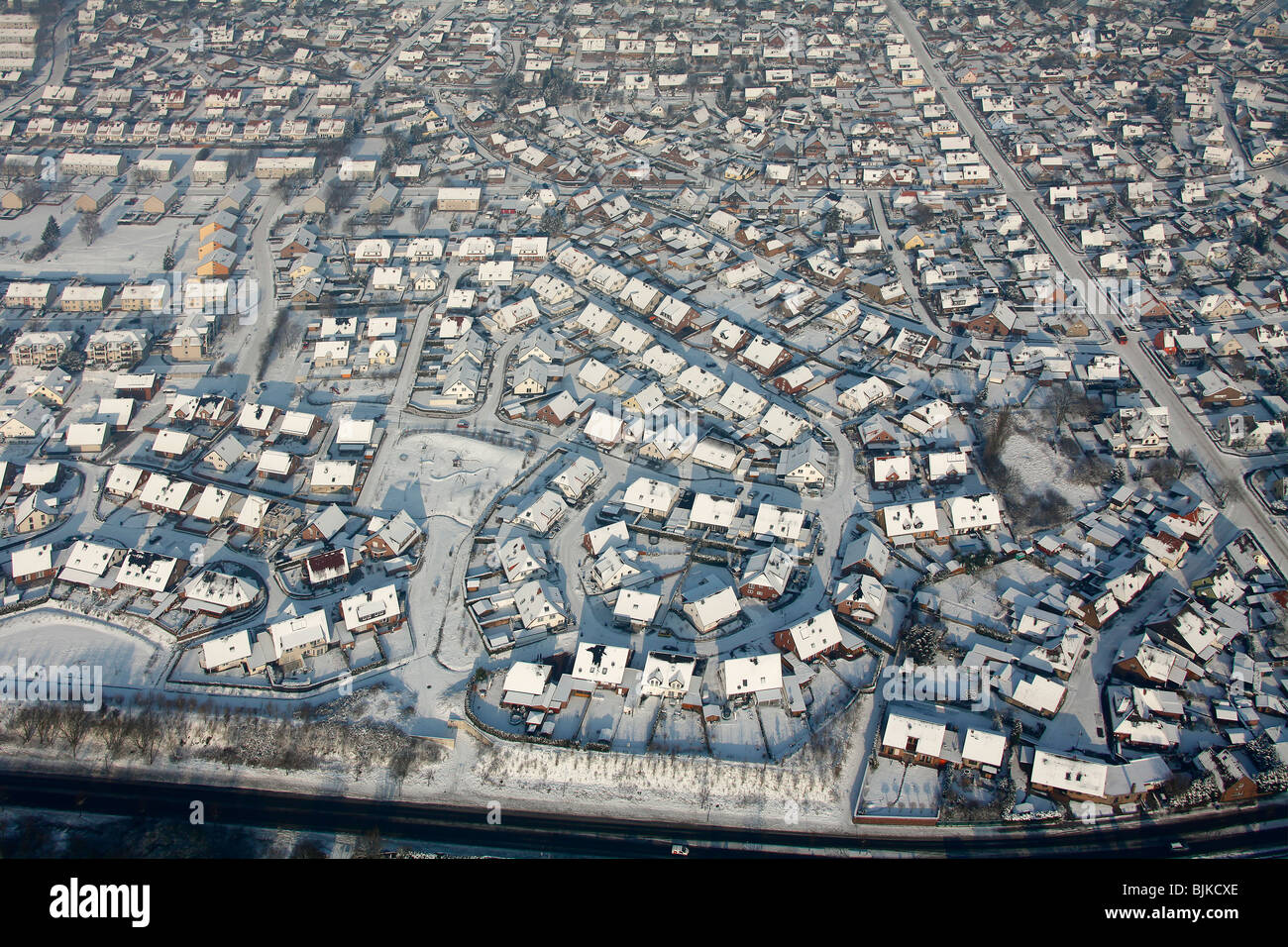 Aerial photo, new housing settlement in the snow, Bockum-Hoevel, Hamm, Ruhr area, North Rhine-Westphalia, Germany, Europe Stock Photo