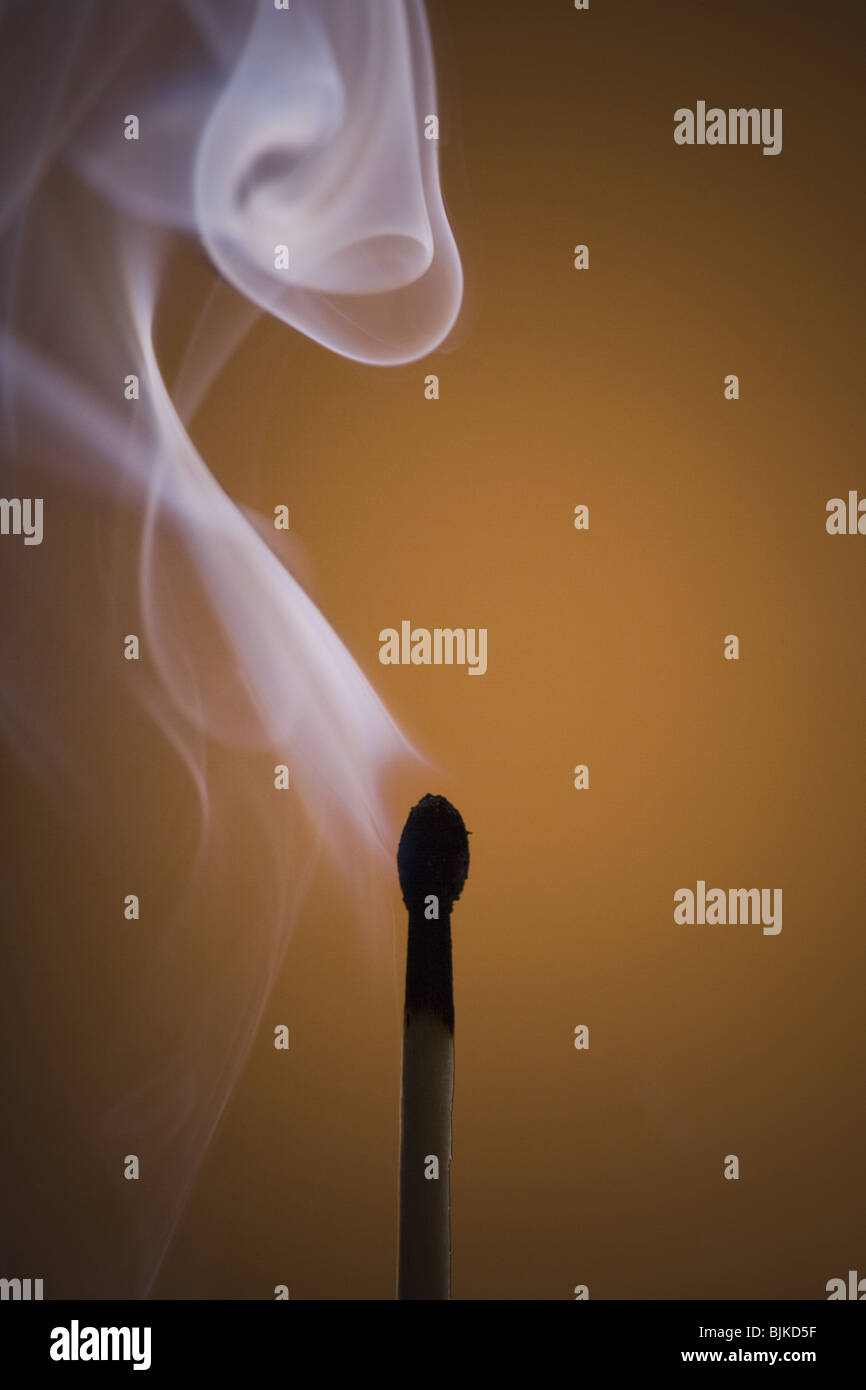 Smoking matchstick Stock Photo