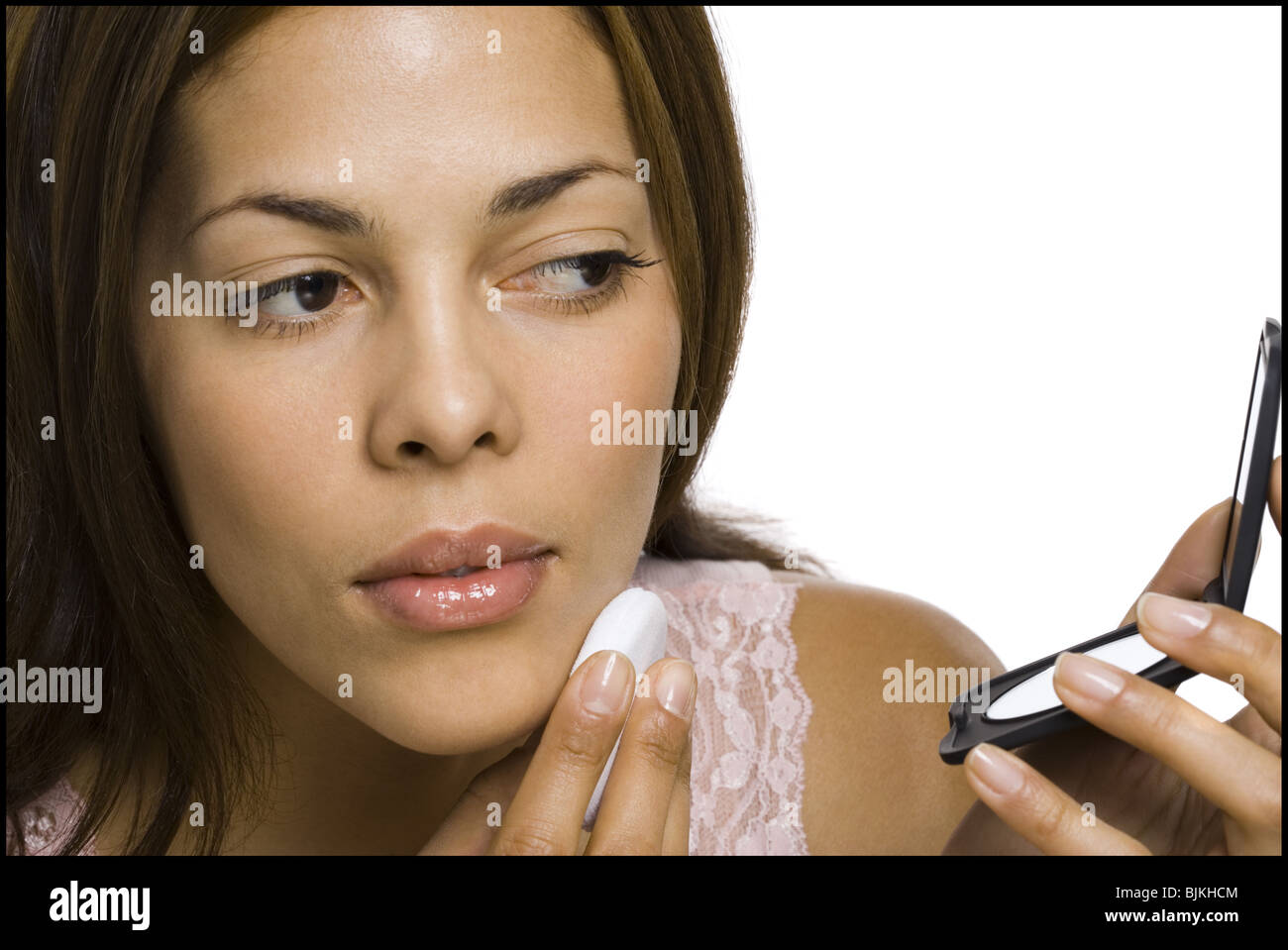 Closeup of woman with powder puff Stock Photo Alamy