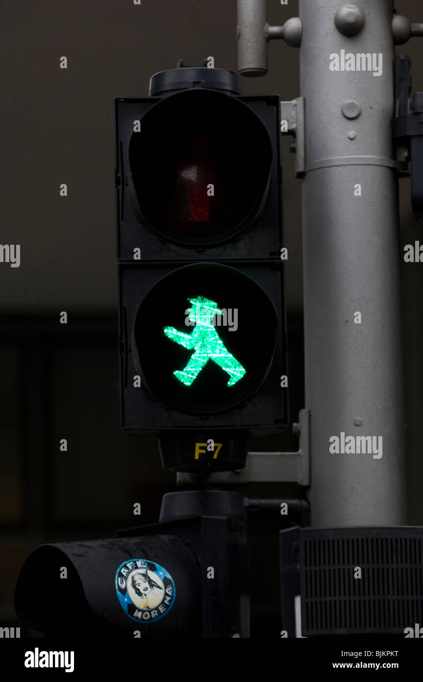 Green man pedestrian crossing sign in Berlin city centre Germany Europe Stock Photo