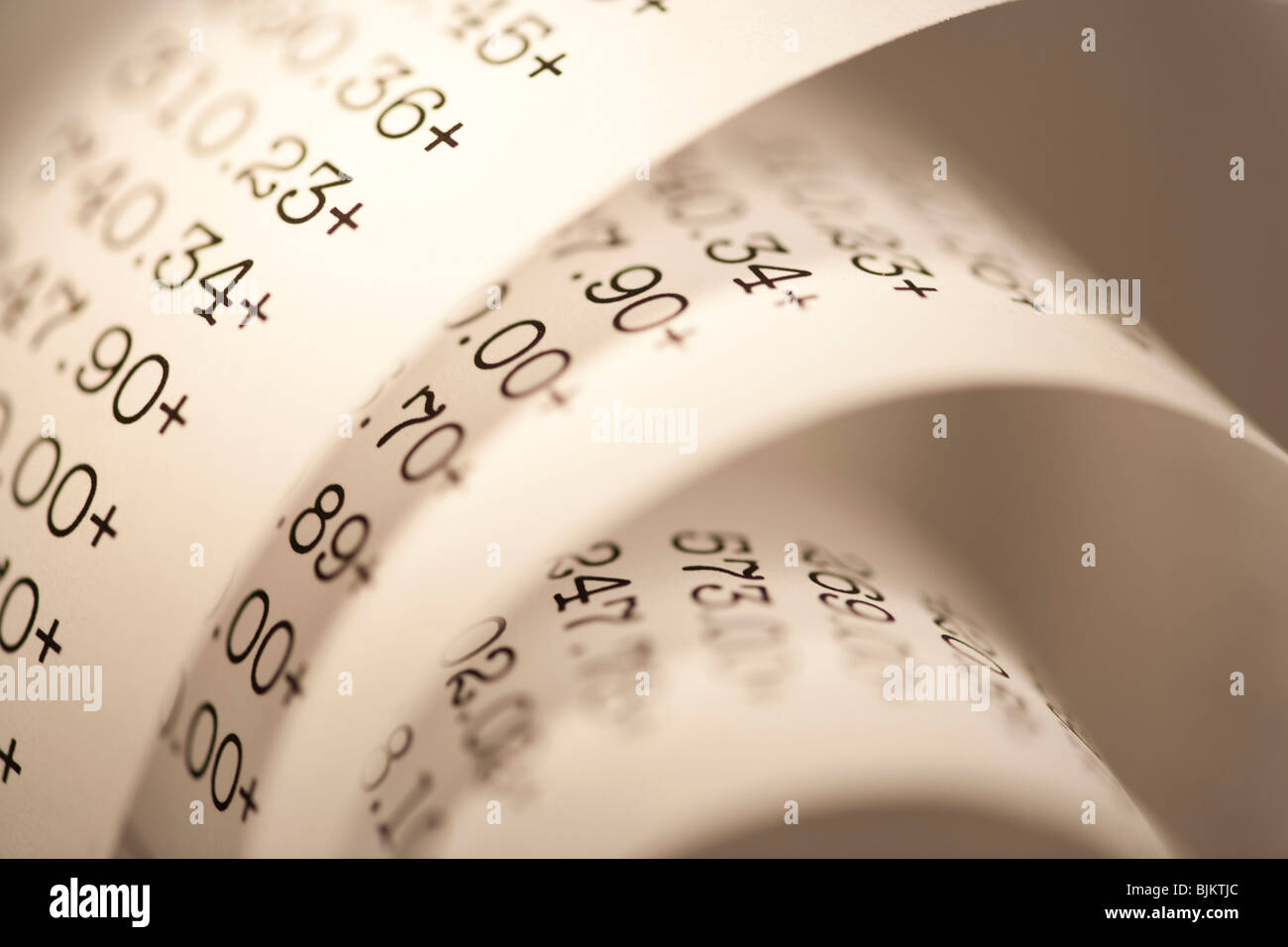 Adding machine tape closeup Stock Photo - Alamy