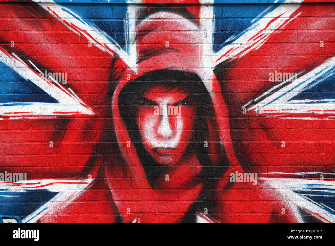 Pic by Mark Passmore/ www.markpassmore.com. Grafitti of a 'Hoodie' with the words ASBO spotted on a wall. Stock Photo