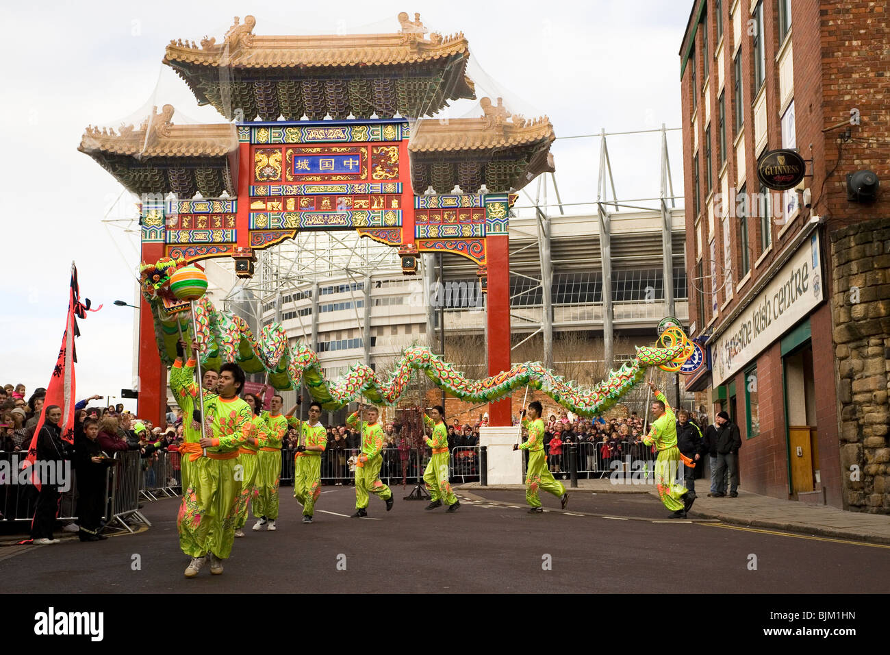 A dragon dance is held at the Chinese Gate as part of Chinese New Year celebrations in Newcastle-upon-Tyne, England. Stock Photo